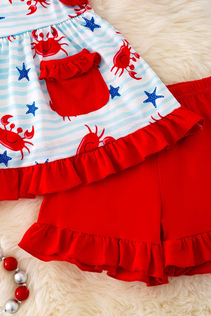 Crab printed tunic w/red shorts.