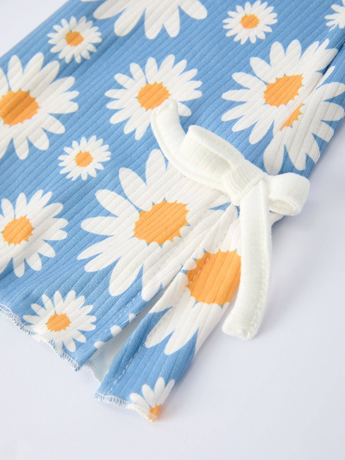 White Top & Daisy-Print Flared Pants