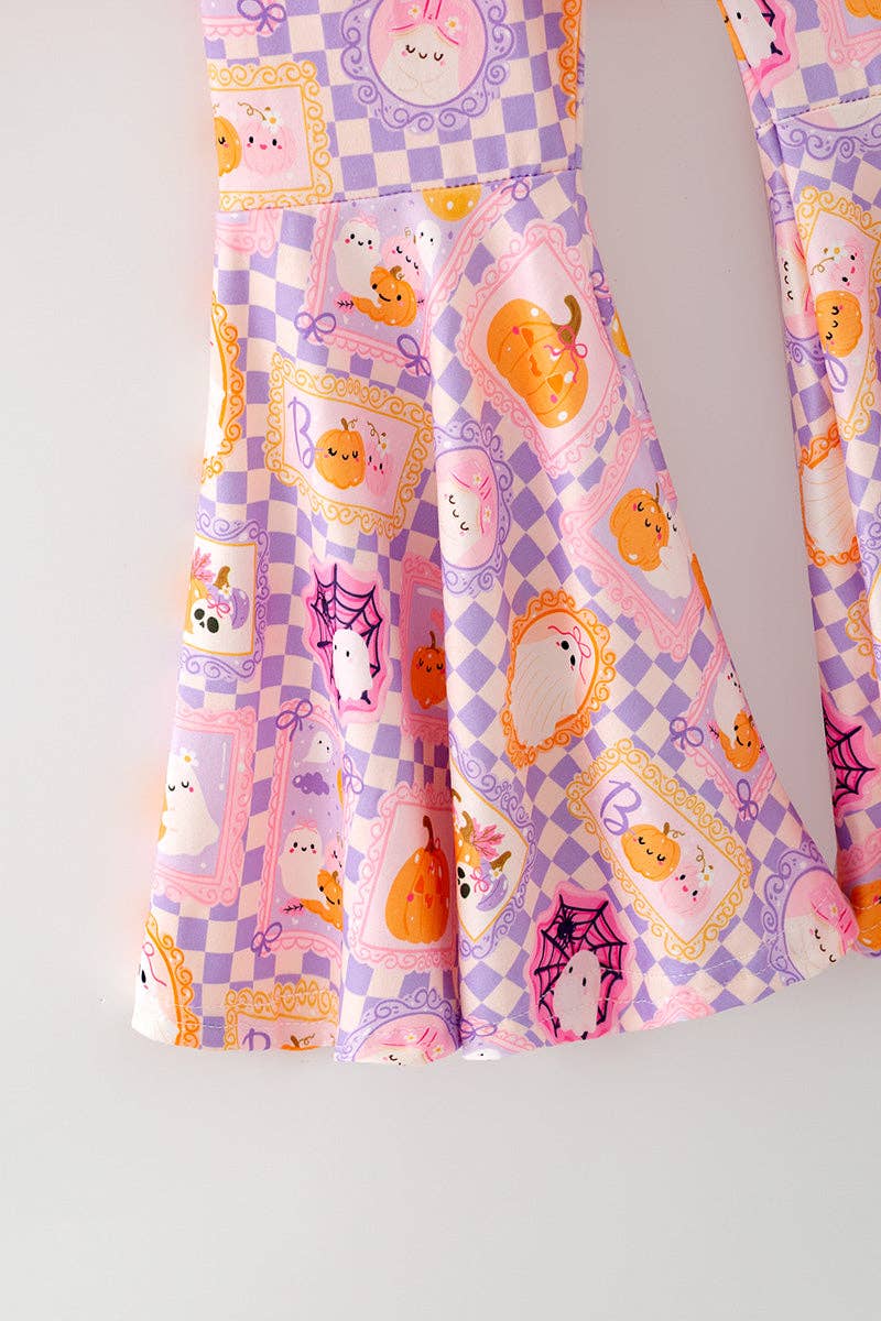 Boo" Pink Sweatshirt with checkered bell bottoms.