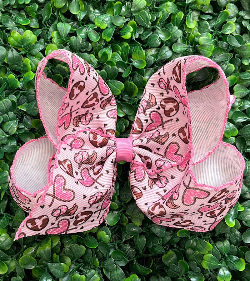 5" Multi printed hair bows with moon stitch trim.