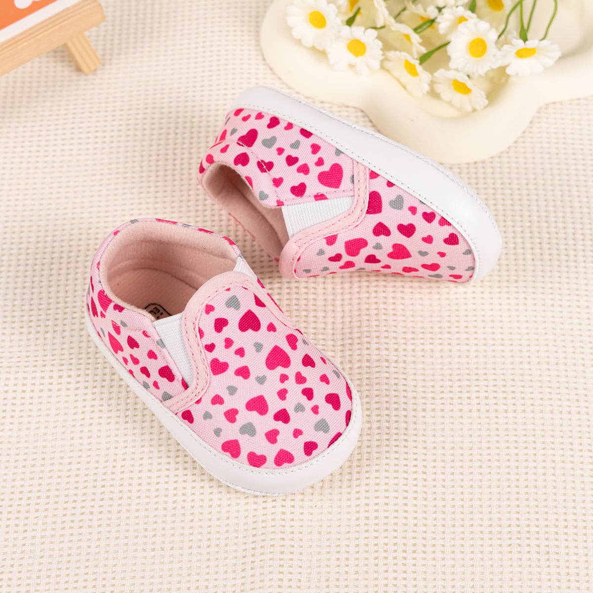 Heart printed slip on baby shoes. CG5165