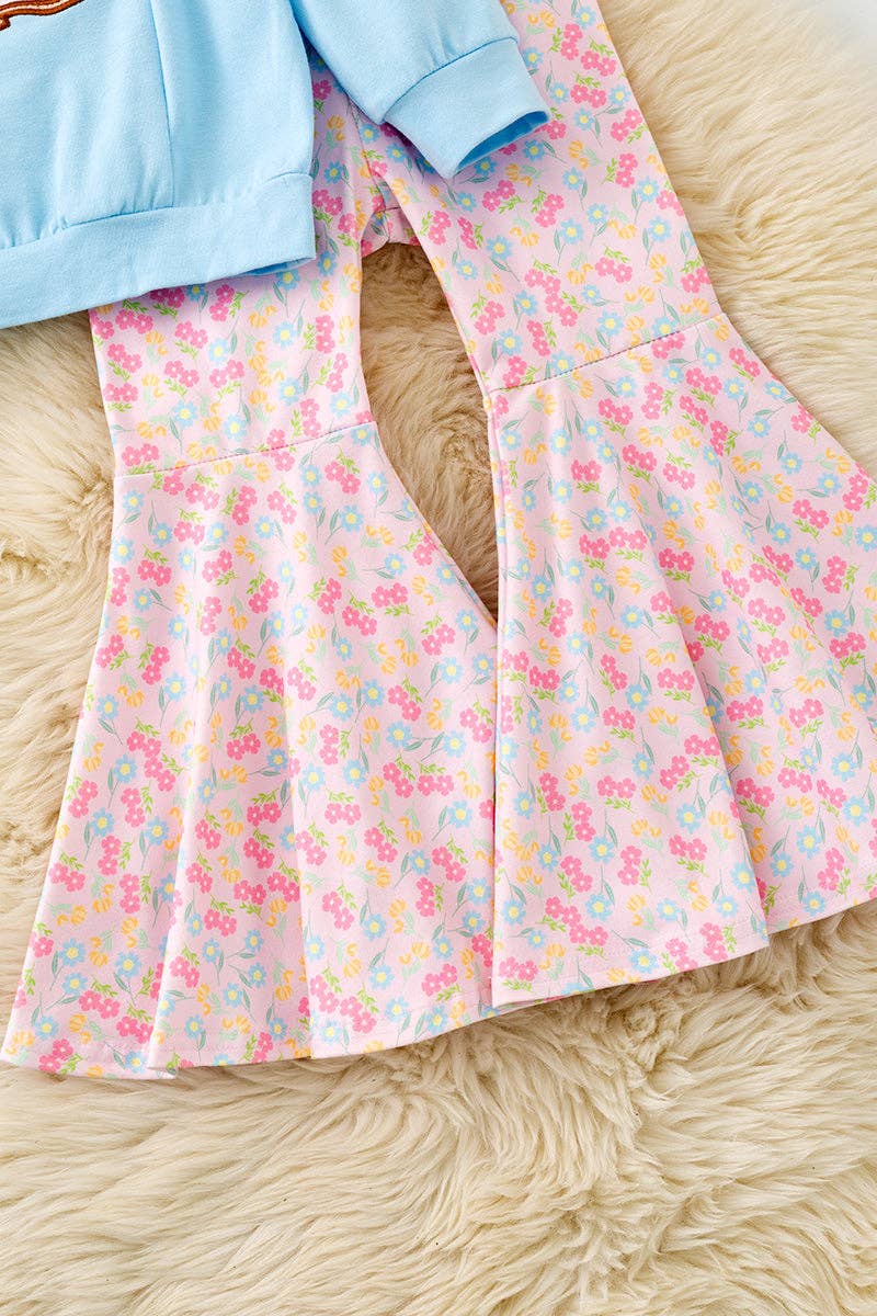Lt. Blue Sweatshirt with boots applique and floral bell bottoms.