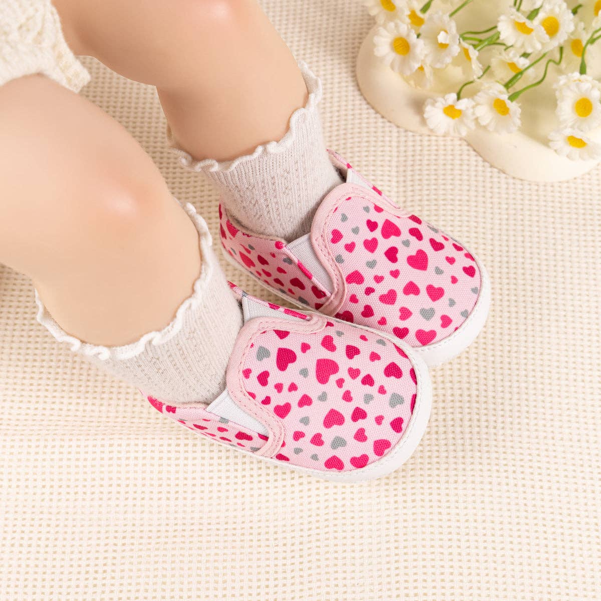Heart printed slip on baby shoes. CG5165