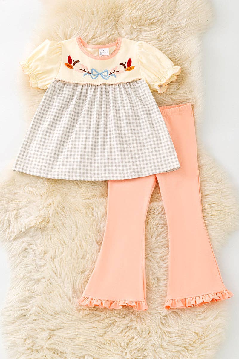 Cute Embroidered top with bubble sleeve & Coral ruffle pants.