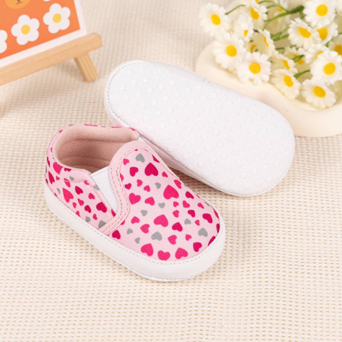 Heart printed slip on baby shoes. CG5165