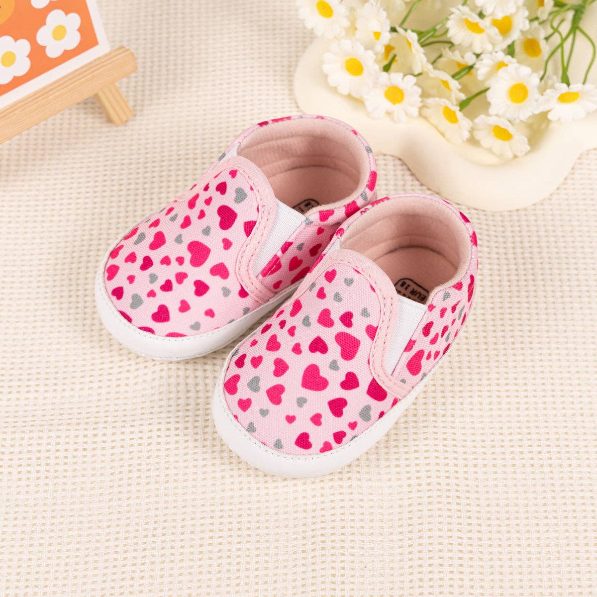 Heart printed slip on baby shoes. CG5165