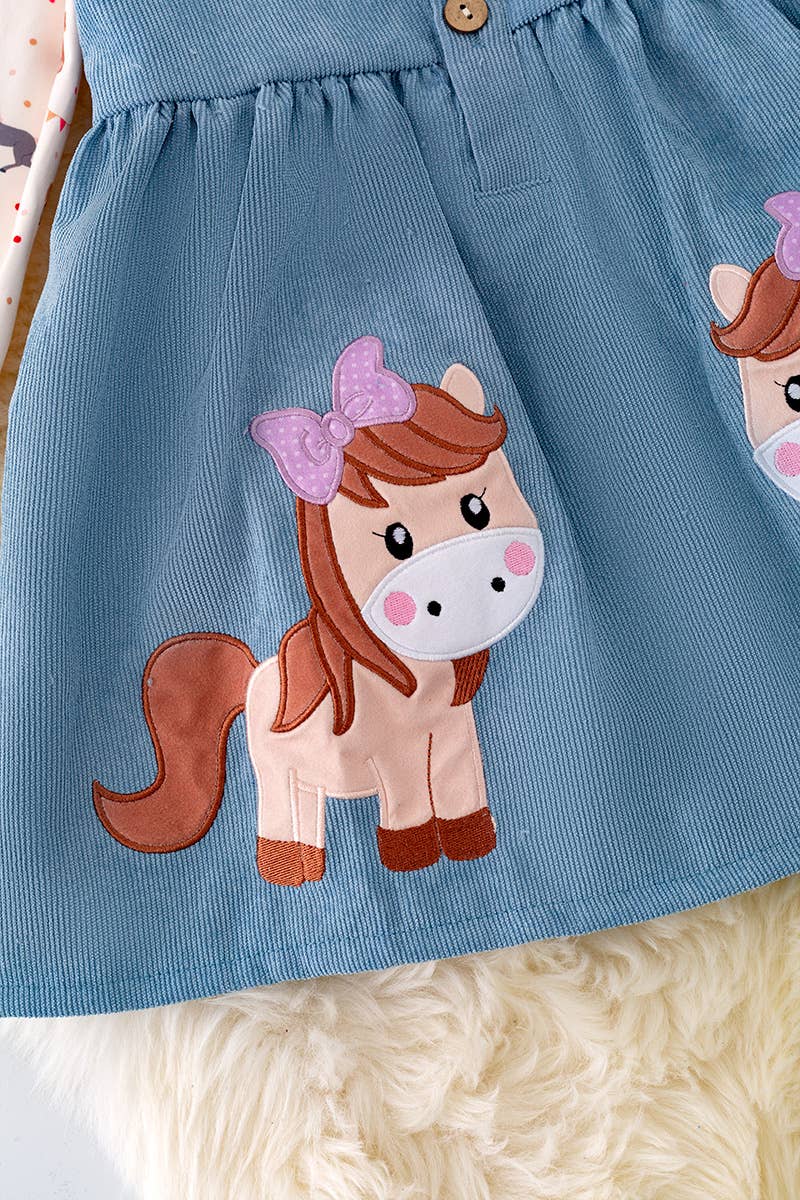 PONY PRINTED OVERALL DRESS.