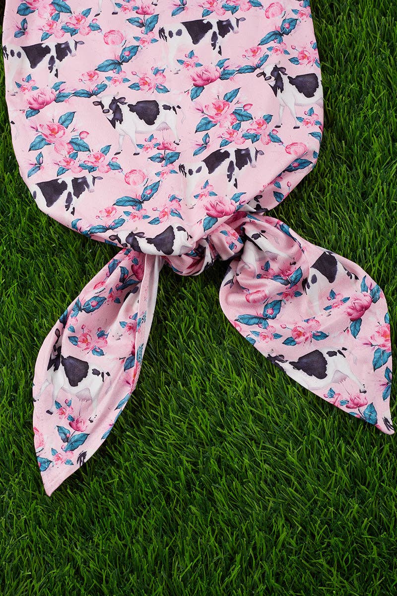 Cow/floral  printed baby gown.
