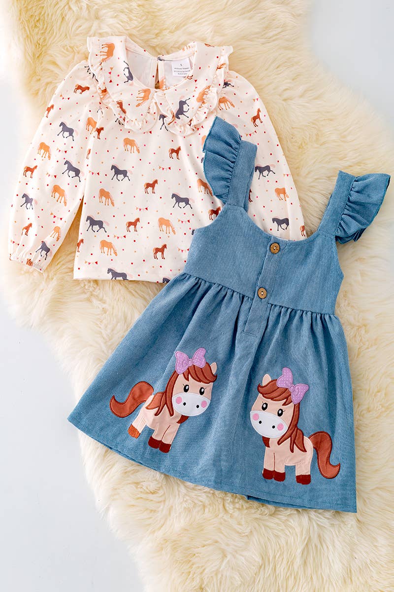 PONY PRINTED OVERALL DRESS.