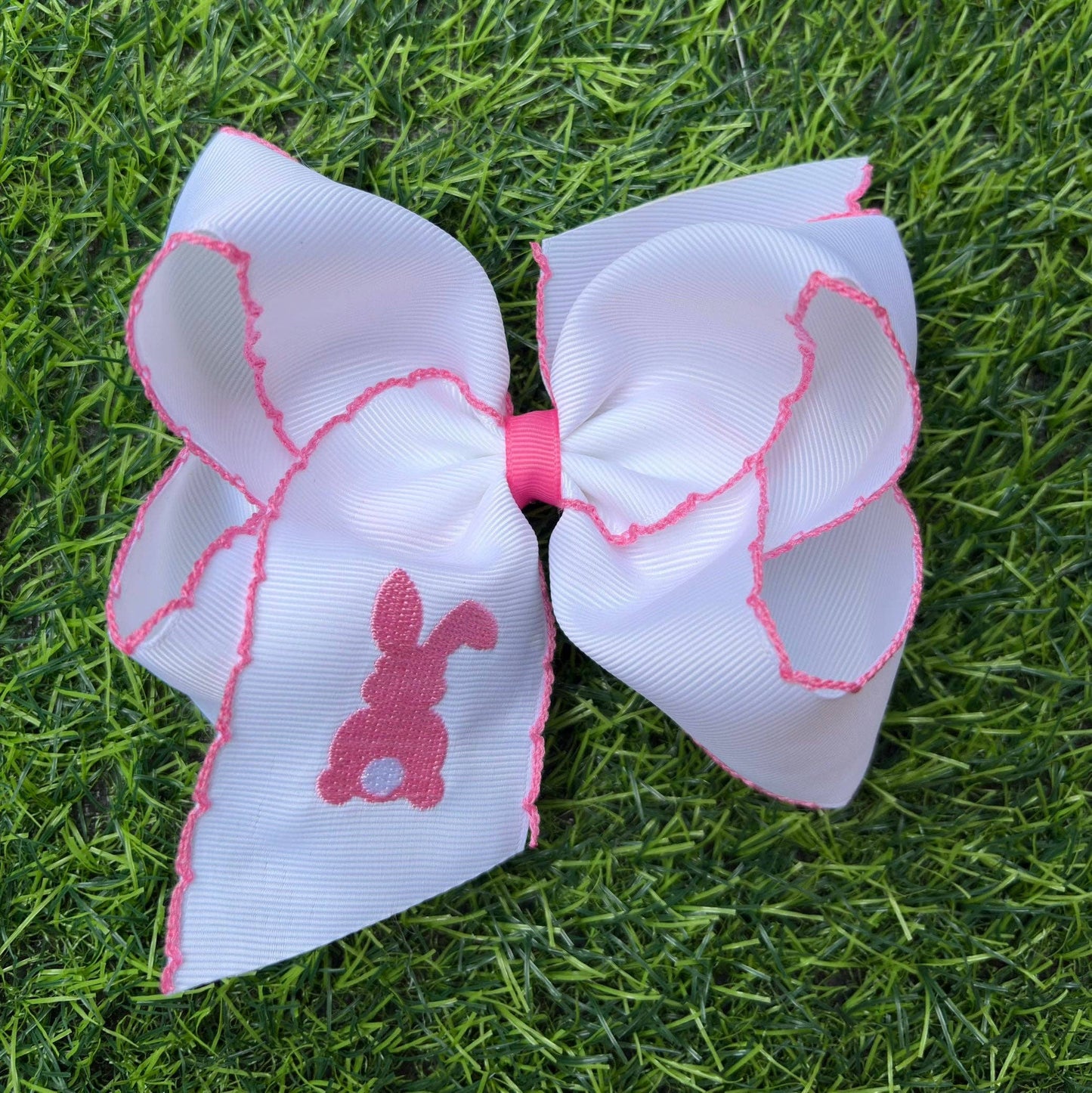 5" Easter hair bows with moon stitch trim.