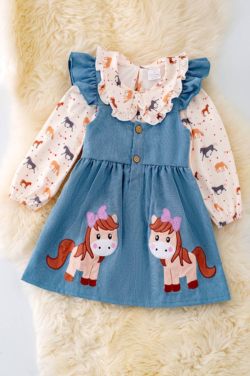 PONY PRINTED OVERALL DRESS.