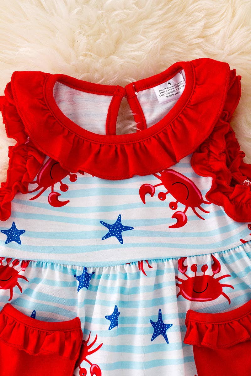 Crab printed tunic w/red shorts.