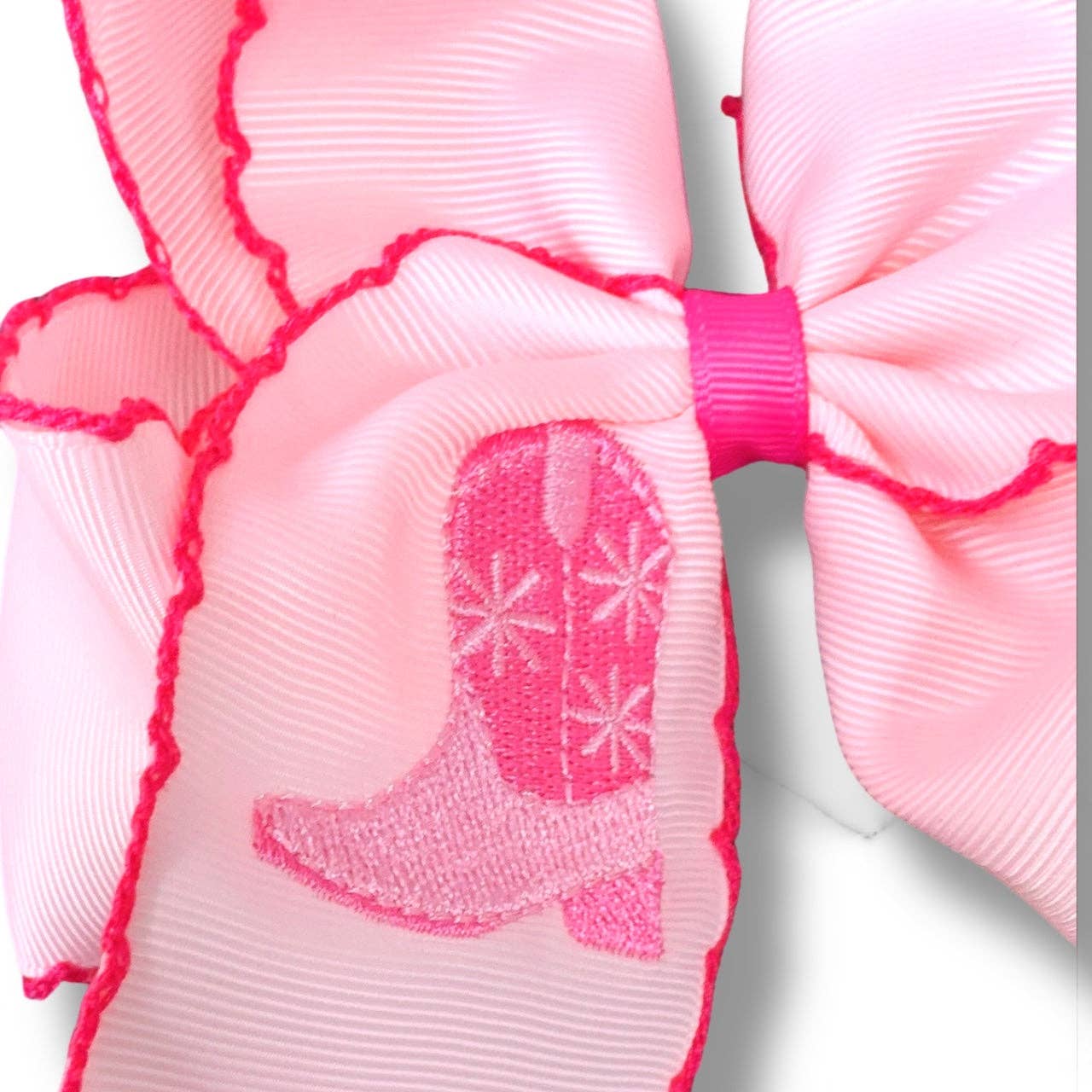 5" Pink western boot hair bow.