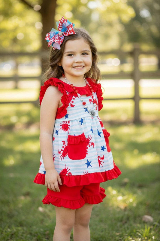 Crab printed tunic w/red shorts.