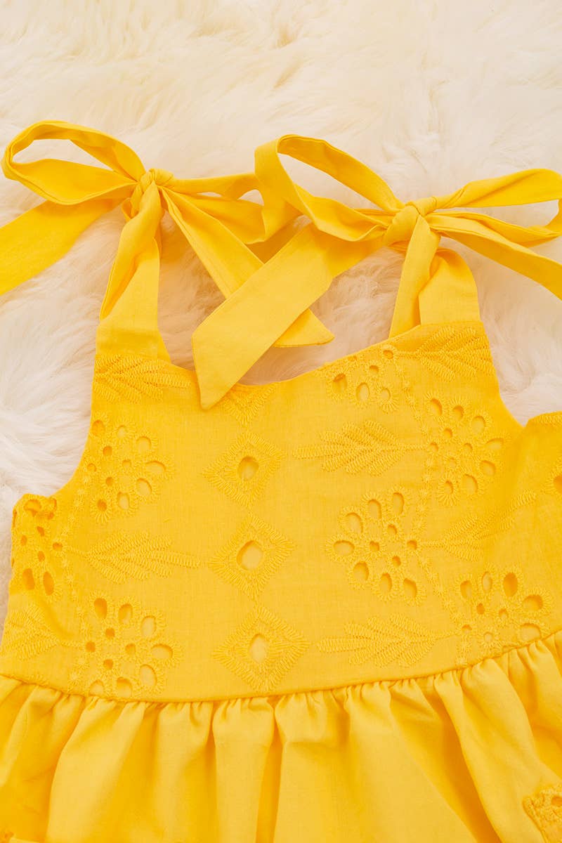 YELLOW EMBROIDERED DRESS WITH RUFFLE HEM.